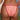 A woman shown from behind wearing a red and white gingham bikini with red trim, standing outdoors with the ocean and blue sky in the background.